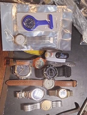 Mixed Lot of 10 Wrist Watches in Blue, Black, Brown, Gold, Silver